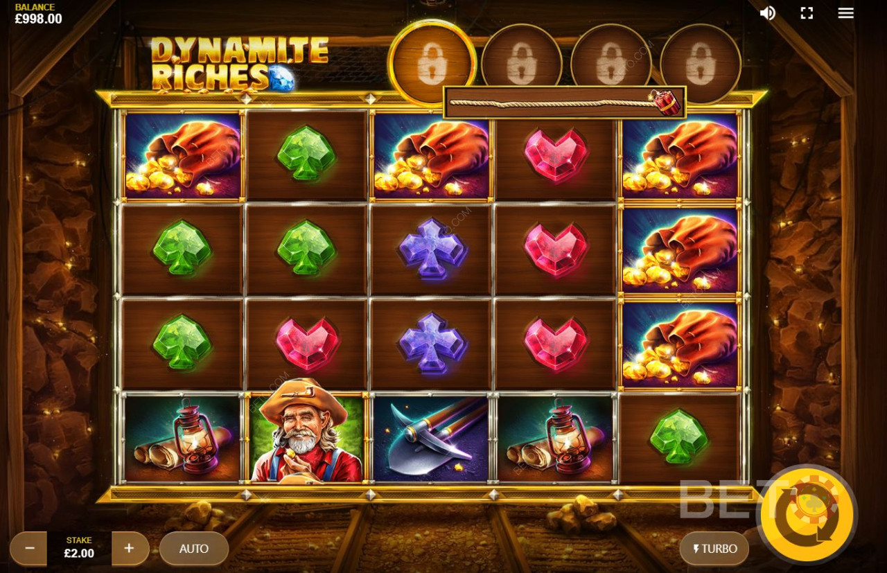 Dynamit Rigdomme har ædelsten, guldmønter og miner som symboler i spilleautomaten.